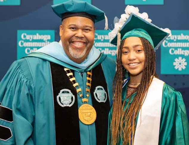 Image of Anita Bennett at the Tri C college graduation with the Michael Baston, the President of Cuyahoga Communicty College (Tri-C)