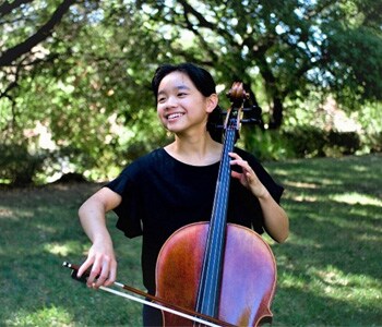 Image of Fiona Tsang playing her cello. 
