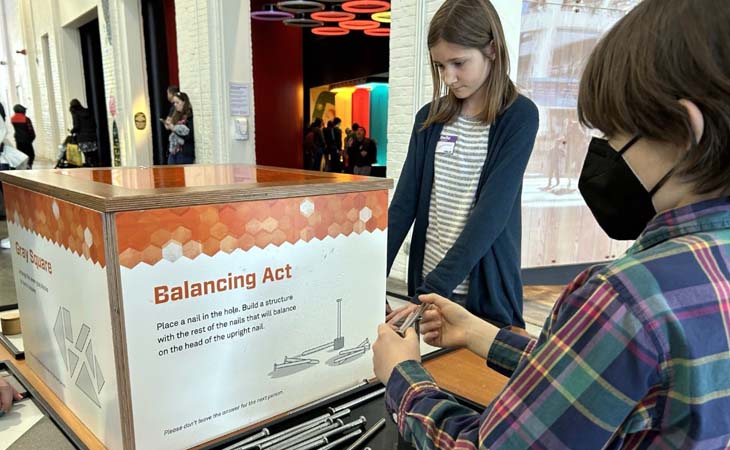 Clara and Finn from Oregon Connections Academy demonstrating a balancing experiment.