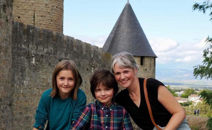 Image of Finn, Clara, and Mom in France.