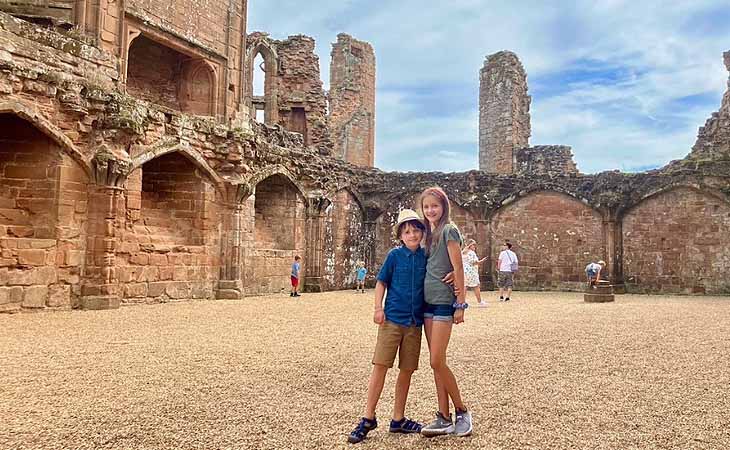 Image of Finn and Clara at the Colosseum Ruins in Rome, Italy.