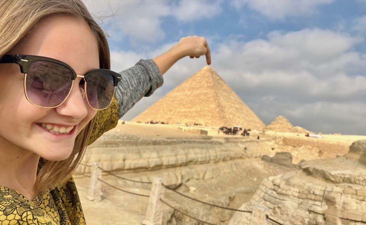Clara from Oregon Connections Academy with her finger on the tip of the Pyramid in Egypt.