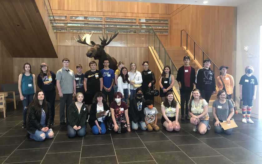 WillCA students at the museum by a moose.