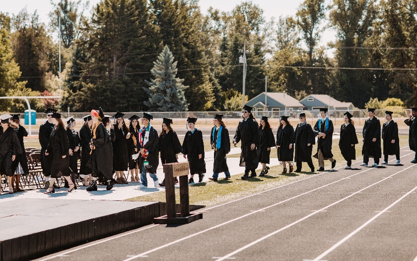 WillCA teachers and students at graduation. 