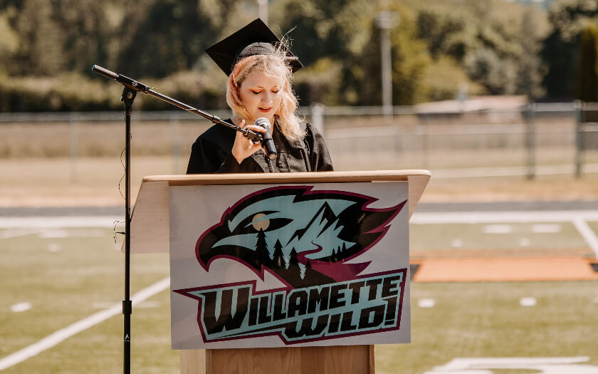 A Willamette Connections Academy student delivers a speech at graduation