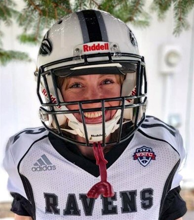 Image of Kelly Shaeffer of Willamette Connections Academy in her football uniform.