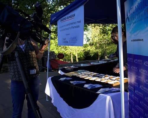 Image of Muaz's Hayat Institute table display at an event. 