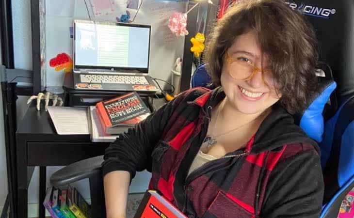 Kyra is a student from Texas Connections Academy - she is sitting in front of her online school work station.