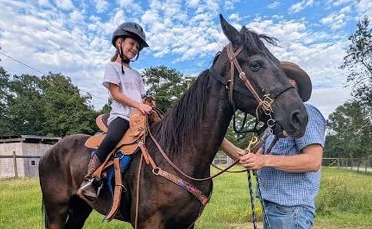 Arlyn from Wyoming Connections Academy riding a horse