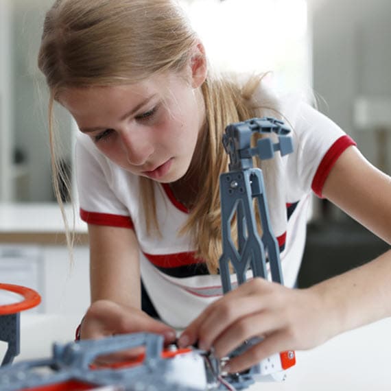 High school student doing STEM Experiment - Connections Academy