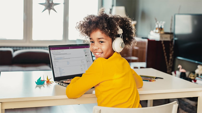 African American female high school student completing online lesson  - Connections Academy