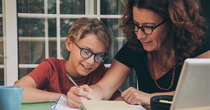 Motehr and son studying online - Connections Academy