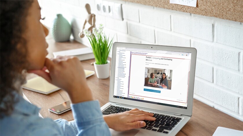 African American female high school student completing online lesson - Connections Academy