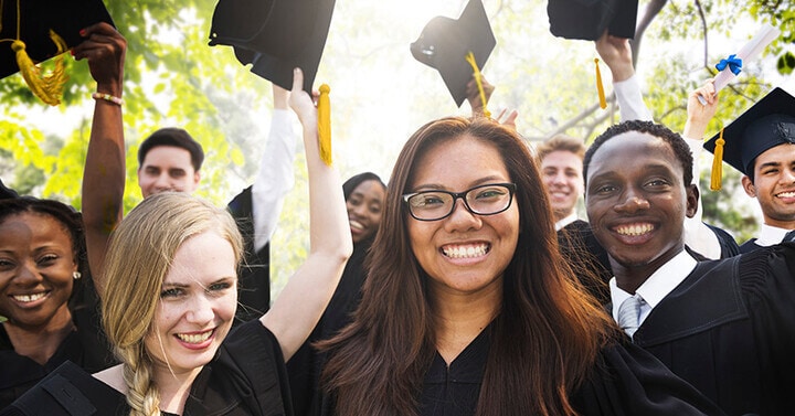 Group of Lighthouse Connections Academy students celebrating at their graduation ceremony