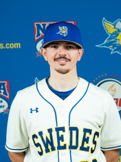 Connor wearing his baseball uniform