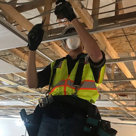 Connections Academy student Neil working as an electrical contractor. 