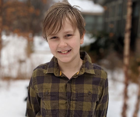 Online elementary school student Oskar smiling