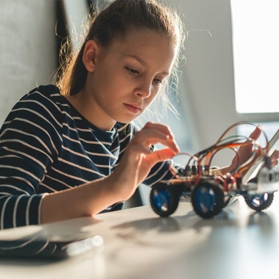 High school student doing STEM Experiment - Connections Academy