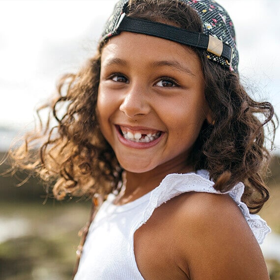 African American elementary school girl smiling at camera - Connections Academy