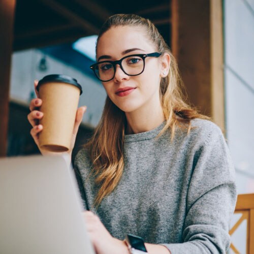 African American female high school student completing online lesson - Connections Academy