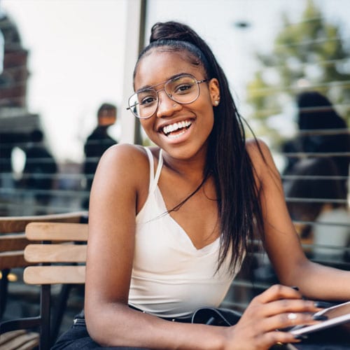 Latinx female high school student completing online lesson - Connections Academy