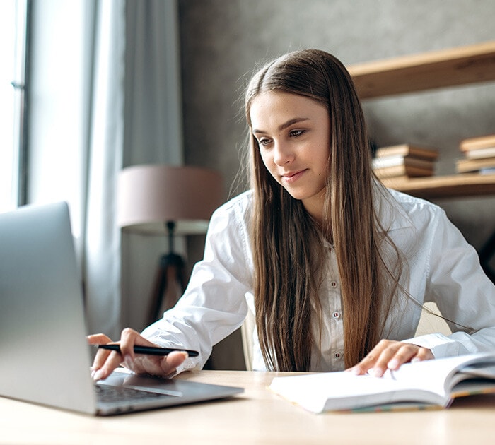 High school student studying on a laptop - Connections Academy