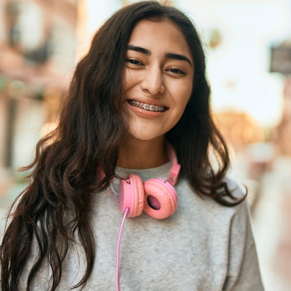 An online high school student smiling - Connections Academy