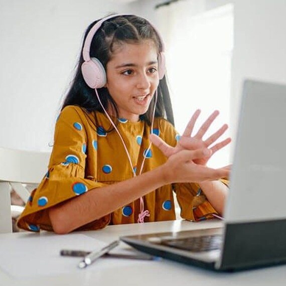 Student engaging in online school on laptop - Connections Academy