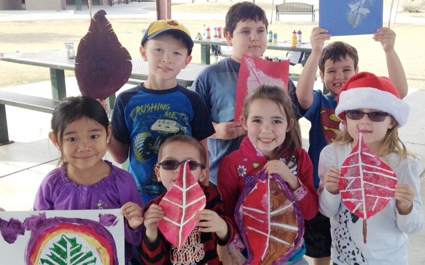 Elementary students show off their crafts project