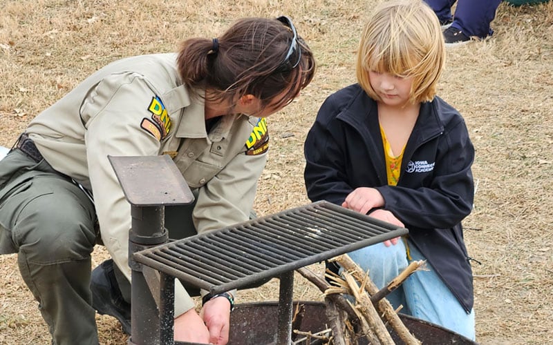 Iowa Connections Academy student at the park with a ranger