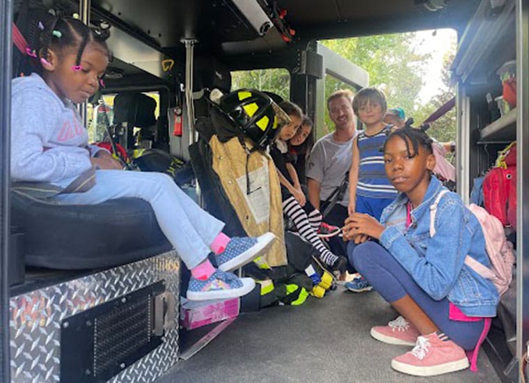 Lowcountry Connections Academy students gathered inside a firetruck