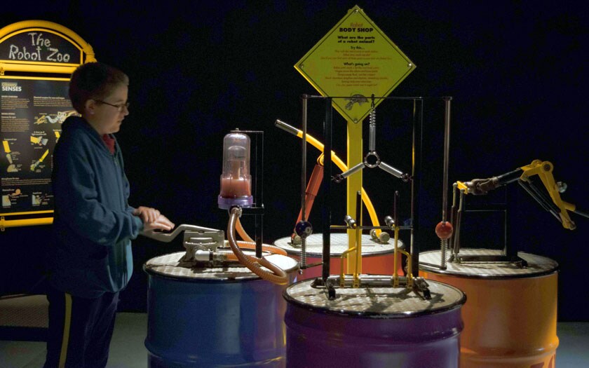 An MCA student at The Robot Zoo at the Portland Science Center