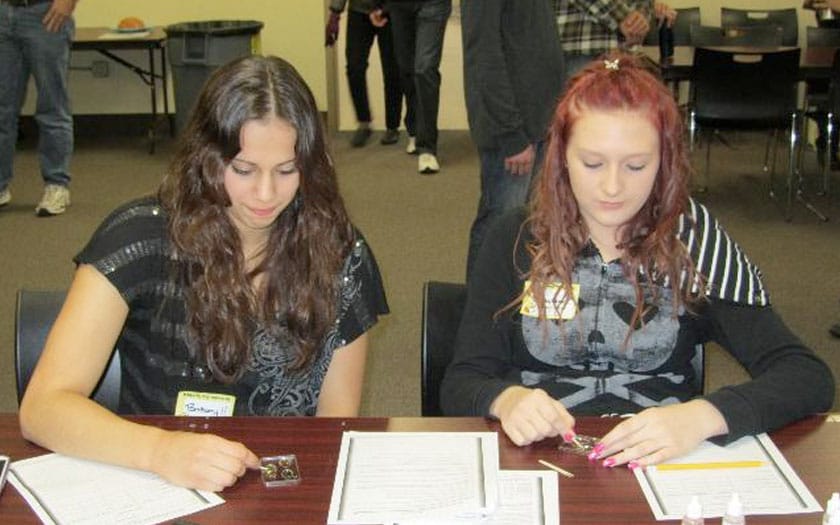 Students participate in experiments during Science Day