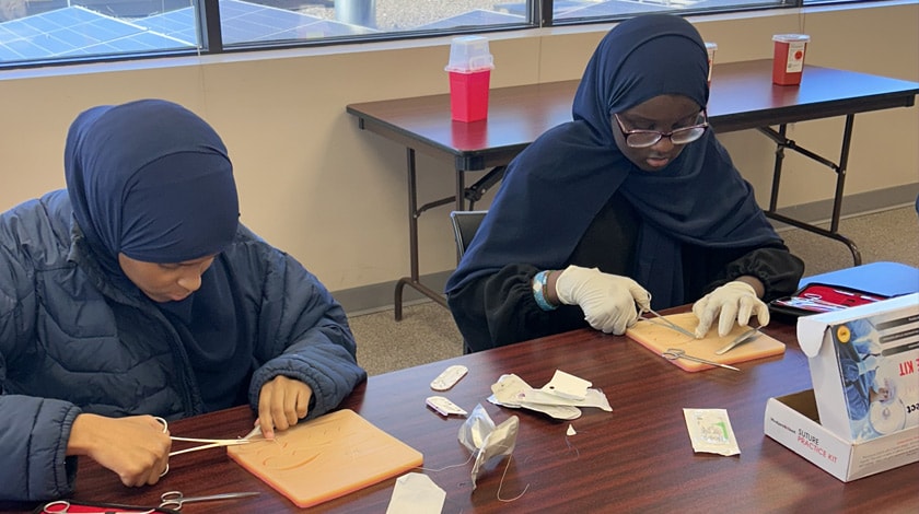 Minnesota Connections Academy HOSA students practice suturing