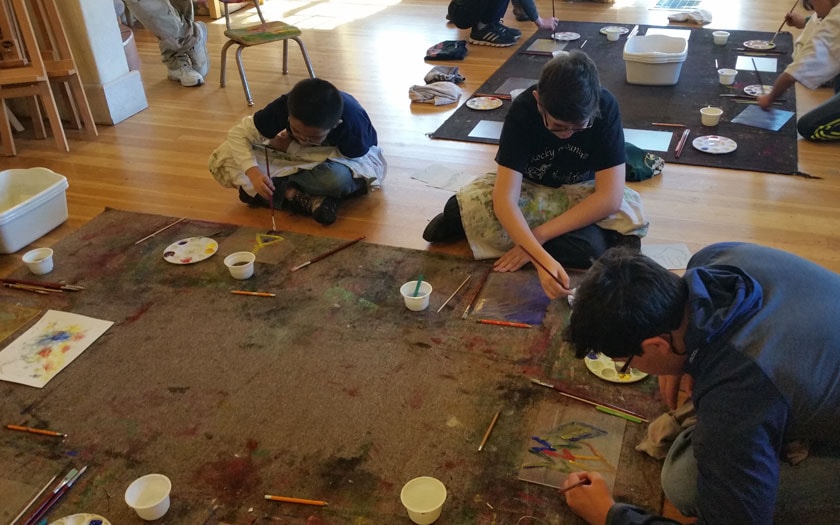 Students on the floor at the Harwood Art Museum in Taos, NM