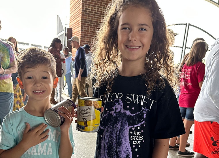 Canned food drive during in-person Meet & Greet