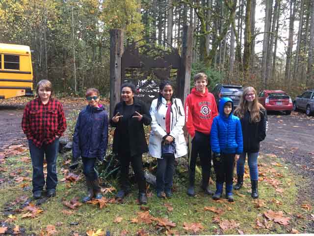 Students hike the Kennedy Creek Salmon trail