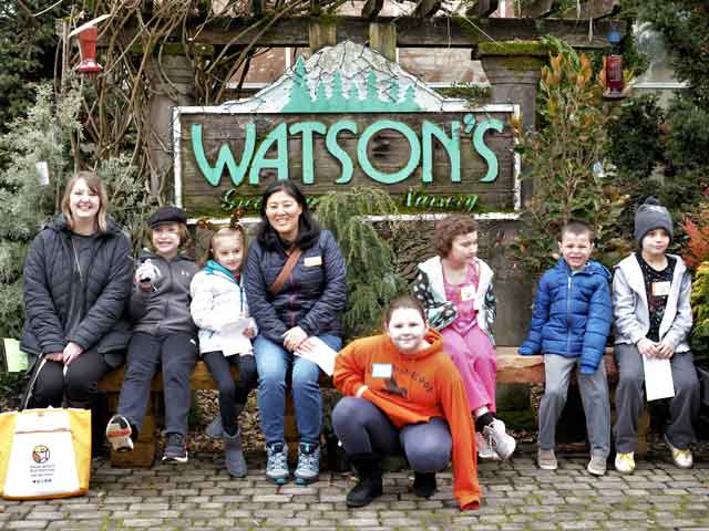 Families enjoy a winter day at Watson&#39;s Greenhouse.