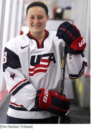 Lyndsey in her hockey uniform