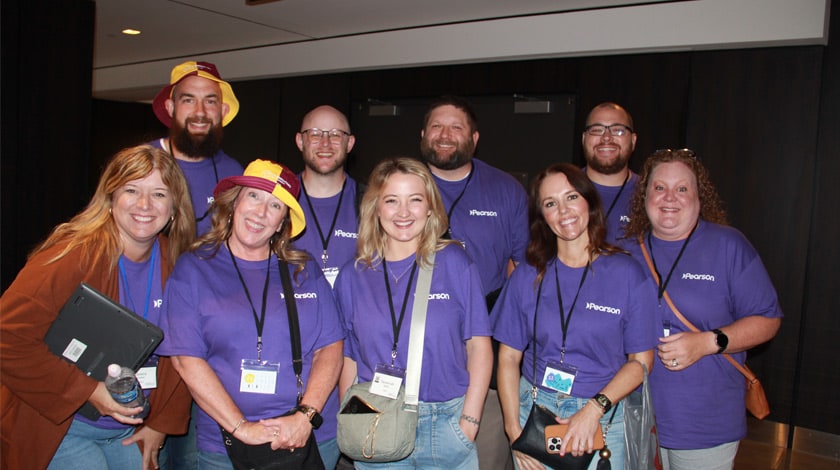 Arkansas Connections Academy staff wearing purple Pearson tshirts together