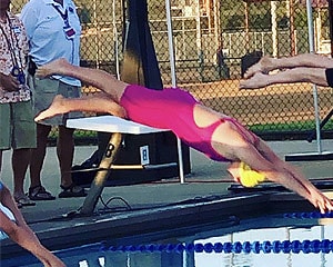 Helen diving into pool