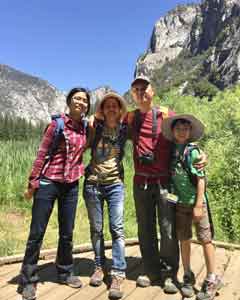 The Vuong family hiking in the mountains