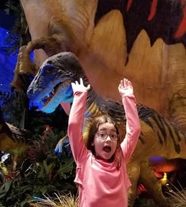 Shelby at a dinosaur exhibit