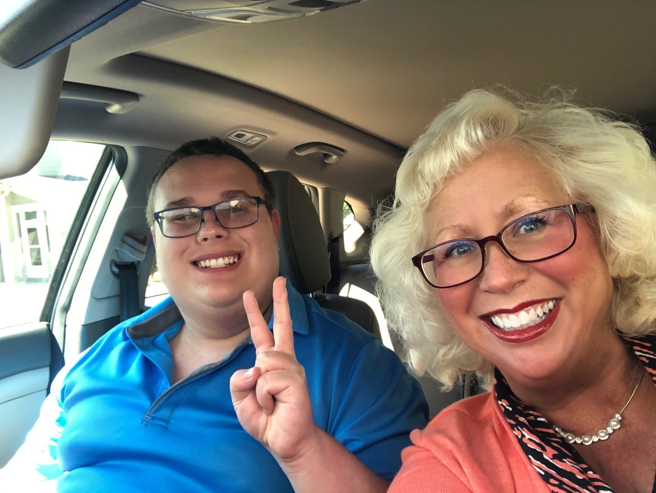 Diane Tabor taking a selfie with her son, who attends Georgia Connections Academy
