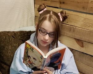 Holli reading a book