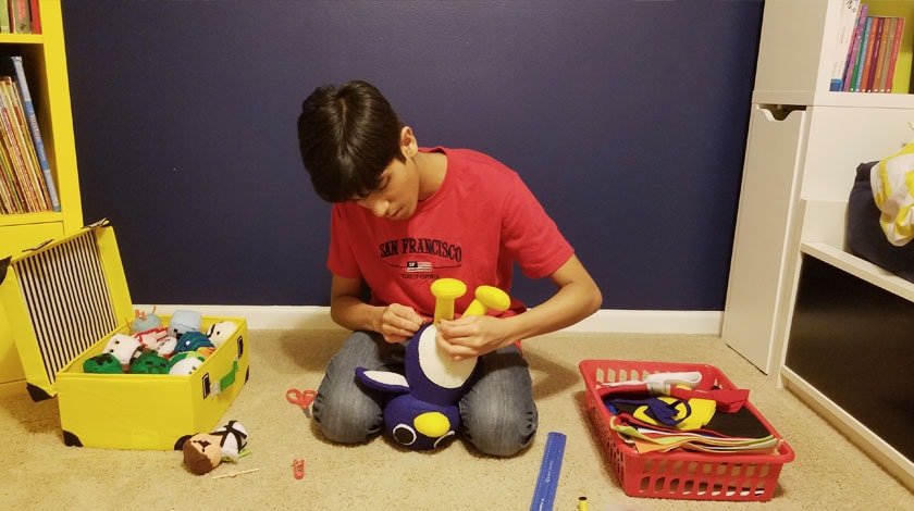 Absar making plushies