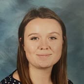 Headshot of Ms. Woenker smiling