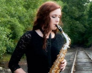 Serena G playing saxophone