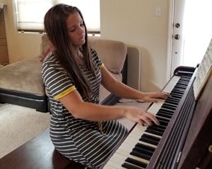 Aryana playing piano