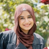 Aroosh smiling